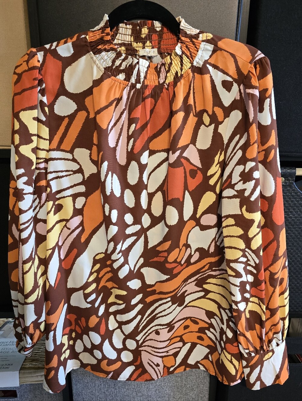 JODIFL Abstract Smocked Neck Long-Sleeve Blouse in Brown, Orange, White, Yellow